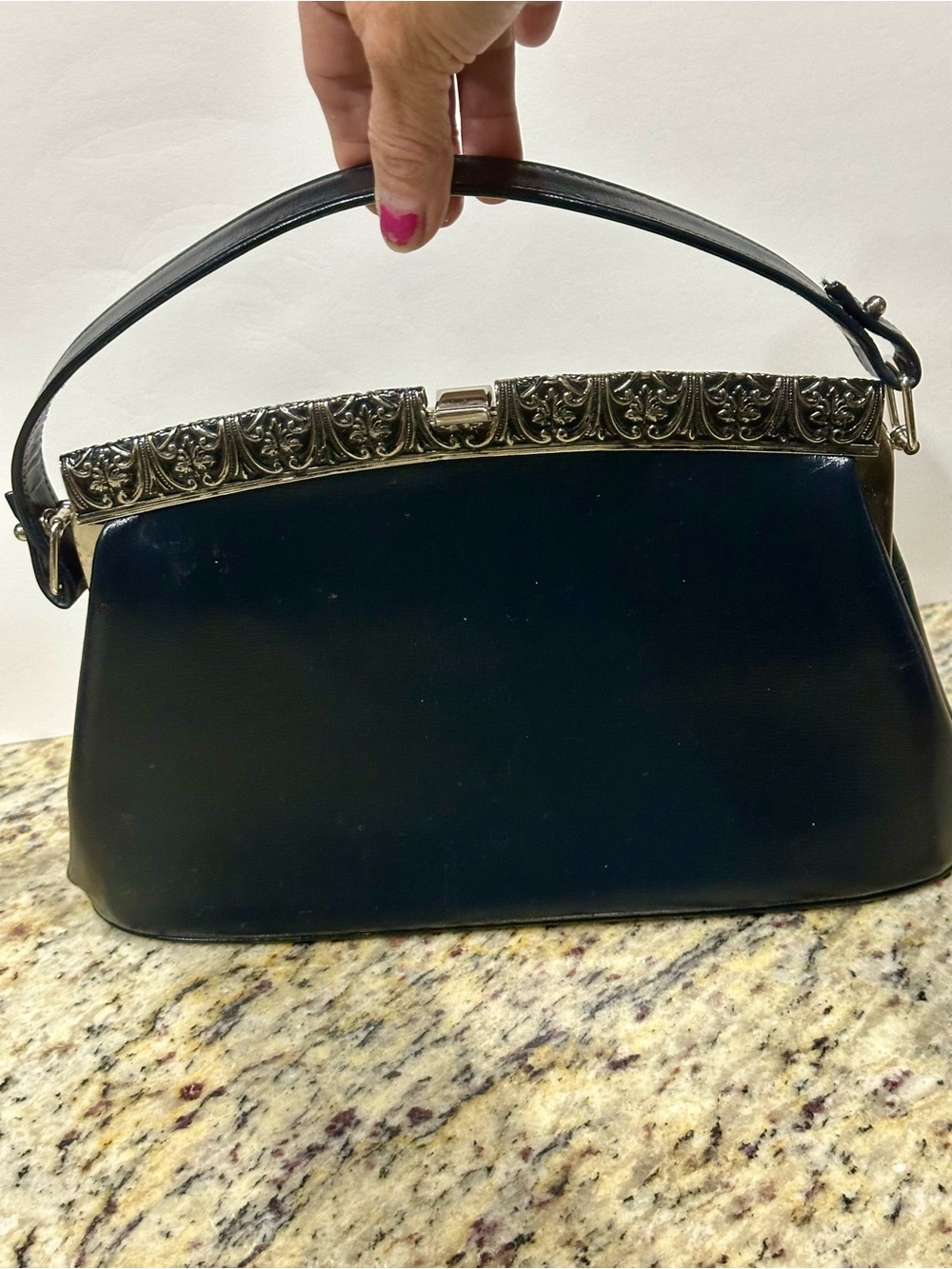 Classic Black Leather Wristlet Clutch with Ornate Silver Accent